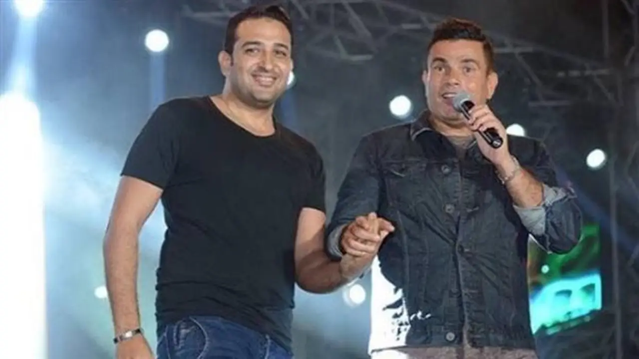 أزمة أغنية “اتأخر عتابنا” تهدد 17 عامًا من التعاون بين عمرو دياب وتامر حسين