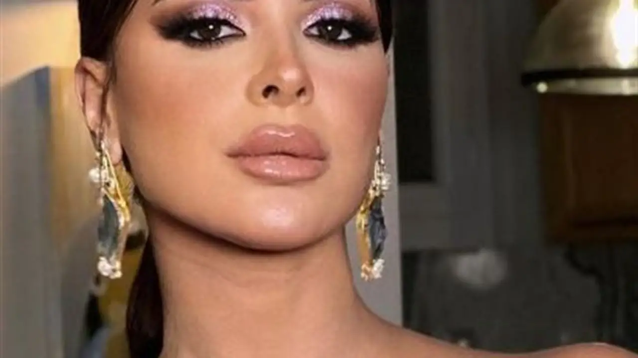 نورهان منصور تتهم زوجها بإرسال رسالة مسيئة عبر واتساب وتحرر محضرًا ضده